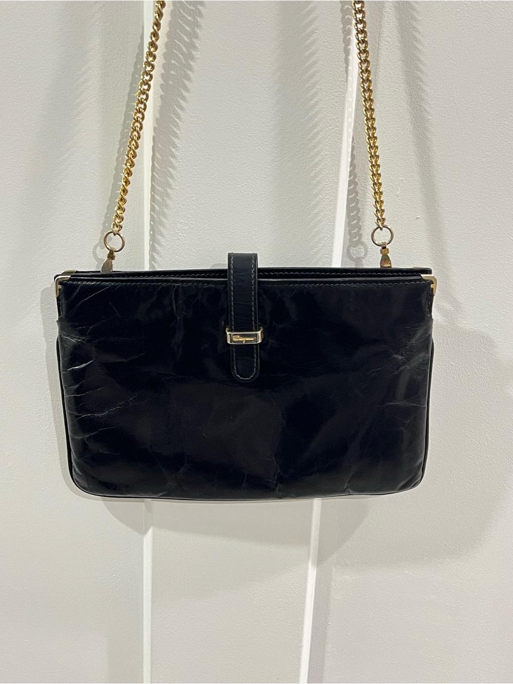 Salvatore Ferragamo soft
Black Leather Chain Crossbody Bag